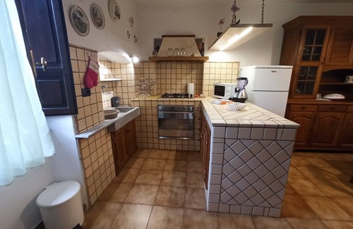 Stazzema House | Gabberi's Breeze is located in a hamlet of houses on a hillside with a sea view
