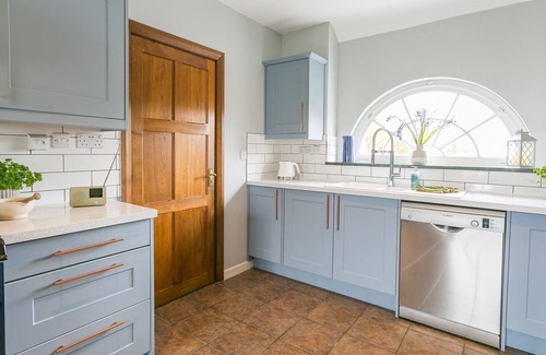 Bryngwran Cottage | Gamekeeper's - a hot tub that sleeps 4 guests in 2 bedrooms