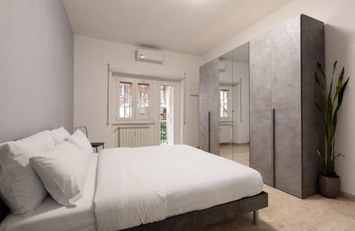 Garbatella Apartment | Garbatella Appartamento Moderno Relax e Comfort
