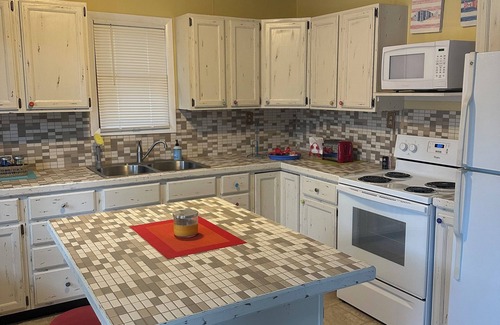 St. Helen Cottage | Get away and relax in this Cheerful Waterfront Cottage! Pontoon Included!