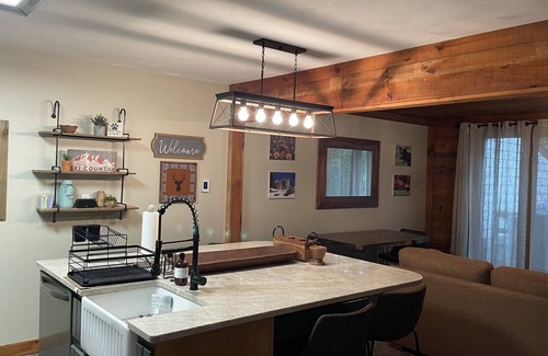 Seven Springs House | Get cozy for the winter in this 3 floor, 4 bedroom rustic ski home