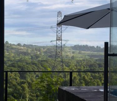 CSJDM House | Glass Cabin Secluded Overlooking Oasis with pool
