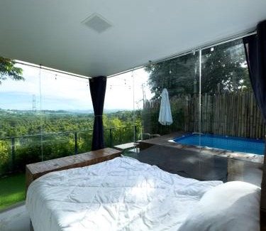 CSJDM House | Glass Cabin Secluded Overlooking Oasis with pool