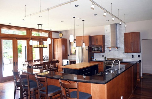 Moran Prairie House | Golf course mid-century modern executive home w/hot tub