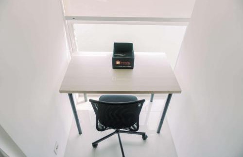 Pinang Apartment | Good and Homey Studio at Pacific Garden Alam Sutera Apartment By Travelio