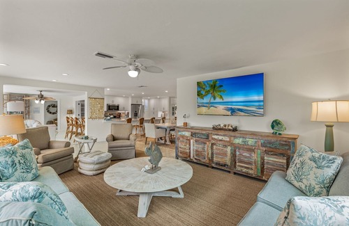 Shell Harbor House | Gorgeous canal front home walking distance to the beach!