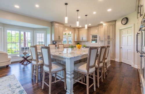 Radnor House | Gorgeous Home featuring an Indoor Heated Pool, Gourmet Kitchen & Outdoor Spaces