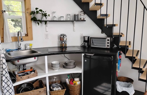 Picture Butte House | Grainbin converted into cozy house.
