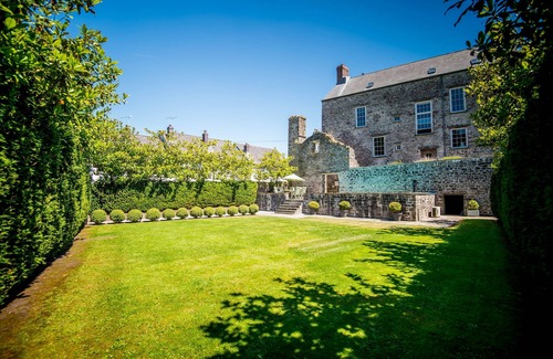 Laugharne Cottage | Grand Georgian House with Outdoor Heated Pool Centrally Located in Laugharne