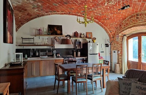 Belveglio Apartment | Grape Court. Cellar Apartment.