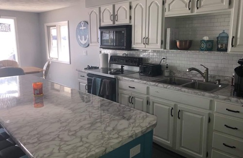 Kalkaska Cottage | Great lakefront property on Manistee Lake with recently remodeled patio area.