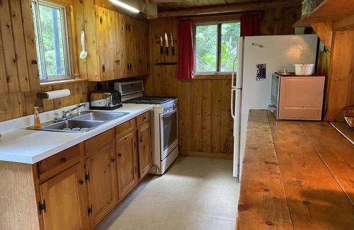 Belgrade Cabin | Great Pond Sunsets - A Classic Camp: Pet Friendly, Kayaks, Dock