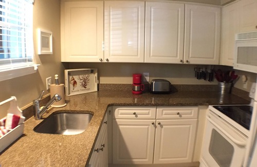 Indian Shores Condo | Great Vacation Condo - Barefoot Beach Resort - Ground Floor