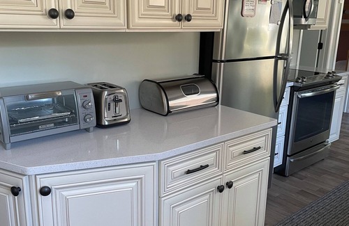 Markesan Cottage | Green Lake Terrace - AC- Fenced Yard -Dog Friendly. 2 short blocks to the beach.