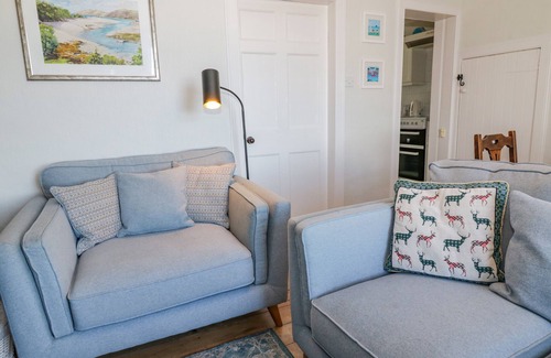 Port William House | GREYSTONES, character holiday cottage, with open fire in Port William
