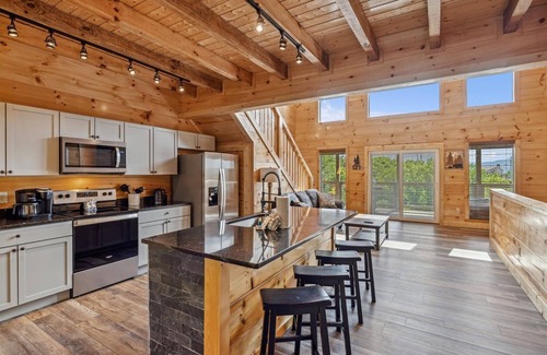 Chalet Village North Cabin | Grizzlies Den 4 Bedroom Cabin by RedAwning