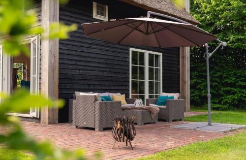 Zuna Ski Chalet | Groepsaccommodatie [2x Reggehooiberg 5p met grote achtertuin]