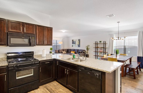 Austin House | Ground-floor home with foosball table, washer/dryer, AC, enclosed patio & WiFi
