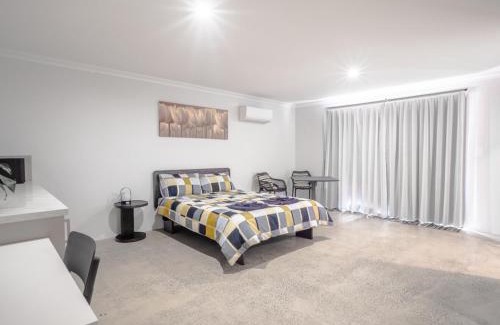 Vasse House | Guest Room with Ensuite & Private Entrance by P2 Living