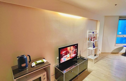 Marine City Apartment | Haeundae Oceanview Escape in Central Marine City, Steps from the Beach.