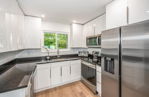 Hampton Bays Ski Chalet | Hamptons retreat w/ hot tub + loft only minutes to the beach