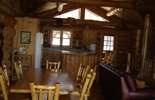 Marcell Cabin | Handcrafted log lodge on Minnesota’s clearest lake. Nestled in the woods.