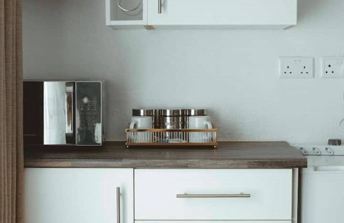 Harare Apartment | Harare Deluxe Studio-Beige Suitenn
