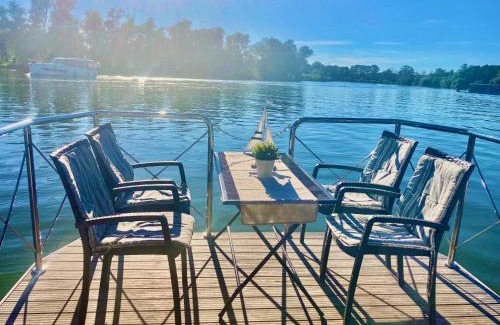 Schumachersiedlung Boat Rental | HAUSBOOT - Schwimmende feststehende Ferienwohnung direkt auf der Havel mit Weitblick aufs Wasser