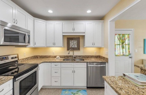 New Smyrna Beach House | Heated Pool home with Hot Tub, 2 Blocks to Beach and 1 Mile North of Flagler Ave