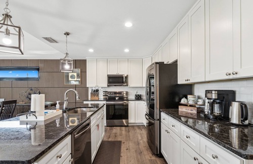 Holiday Beach House | Heated Pool & Pet Friendly | Minutes To Beach | Spacious Backyard | FLPCB38