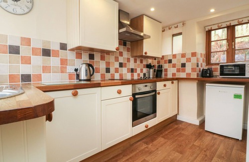 Wheddon Cross Cottage | HEDGEHOG COTTAGE, pet friendly, with open fire in Wheddon Cross