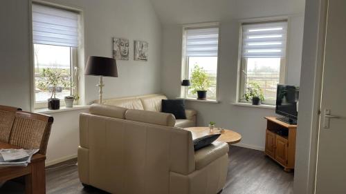 Buitenpost Apartment | Heerlijk hoek appartement net buiten het dorp