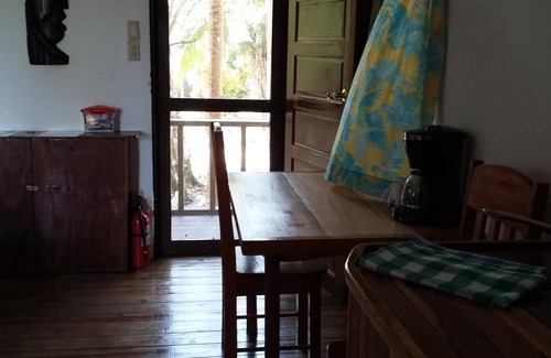 Unitedville Cabin | Heliconia is a self catering studio cabin with jungle facing private balcony