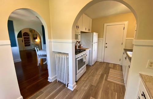North of Grand Apartment | High Brick Haven near Ingersoll - Where Vintage Vibes & Comfort Collide!
