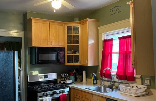Highland Square House | Highland Square's historic charm. Book now for an unforgettable Akron stay!