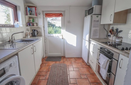 Crynant Cottage | HILLCREST, pet friendly, with open fire in Port Eynon