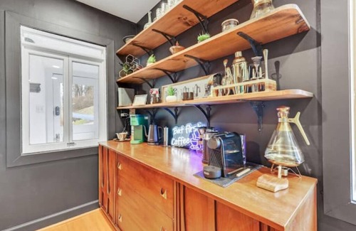 White Hall House | Hillside Haven with Outdoor Tubs + Vintage Library