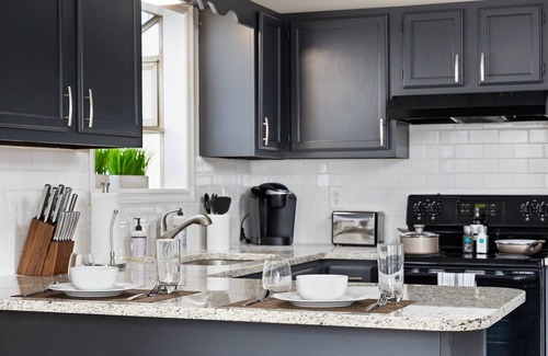 Five Points South Condo | Hilltop Getaway- Groups/6 units/King Beds/Parking