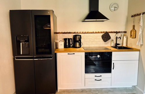 Neustadt in Holstein Apartment | Hilly vacation apartment in a small fisherman's house right on the harbor