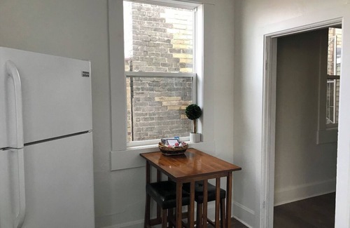 Two Rivers Apartment | Historic downtown upper loft. 6 blocks to the beach 🌊