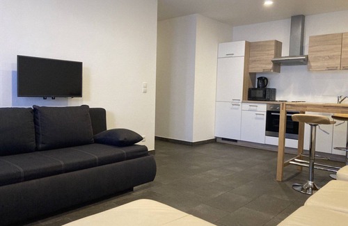 Grettstadt Apartment | Hochwertig und modern eingerichtete Ferienwohnung mit extragroßem King Size-Bett und kostenfreiem WLAN