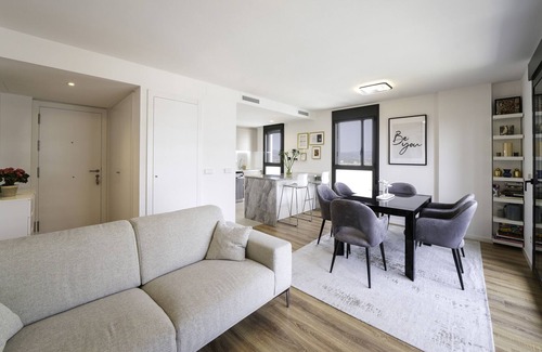 Cornella de Llobregat Apartment | Holiday Apartment "Sunsets and The Pool In Barcelona" with Balcony, Shared Pool & Wi-Fi