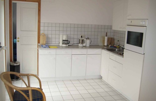 Dandorf Apartment | Holiday apartment with balcony, water view and garden