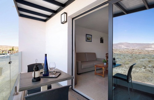 Arrieta Apartment | Holiday Apartment “Callao Beach 10” with Mountain View, Terrace & Wi-Fi