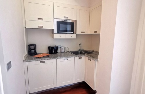 Meina Apartment | Holiday apartment with air conditioning and WLAN