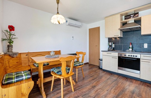 Lichtenwalde House | Holiday Home 'Bungalow Sebastian' with Private Terrace, Wi-Fi and Air Conditioning