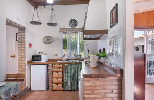 Aljaraque House | Holiday Home 'Golf Azul' with Shared Pool, Wi-Fi and Air Conditioning
