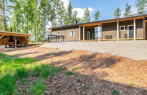 Enonkoski House | Holiday Home Hot pool cottage kesäranta by Interhome