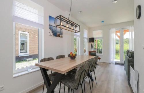 Municipality of Nissewaard House | Holiday Home in Simonshaven near Lake Beach