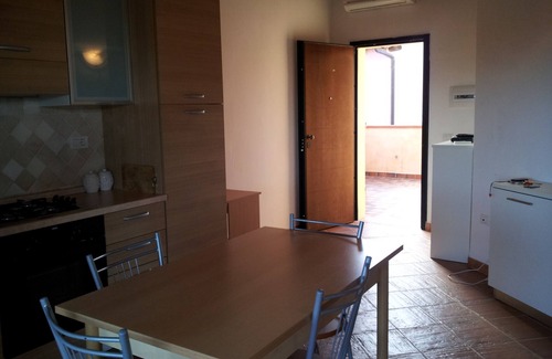 Baia Caddinas House | Holiday Home 'Orizzonti 34' with Sea View, Private Terrace and Air Conditioning